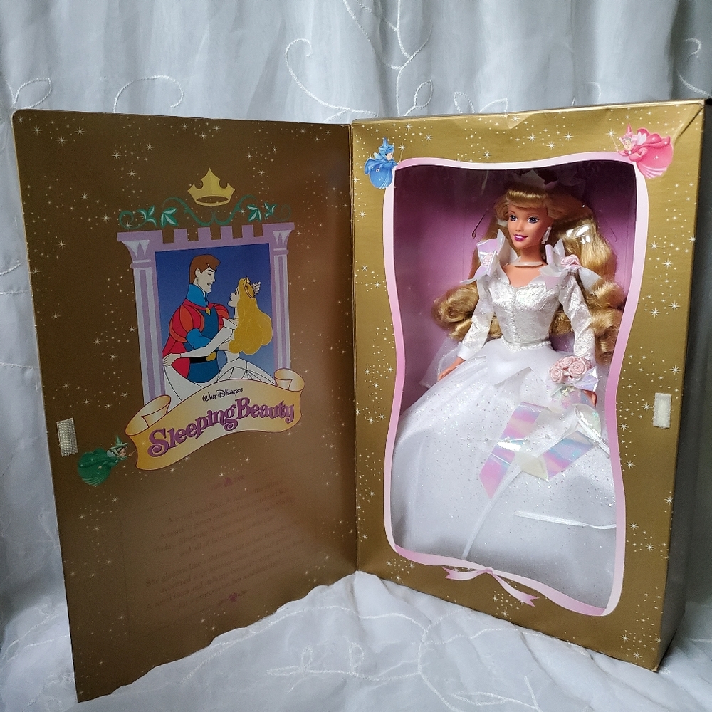 MUST GO- Sleeping beauty collectible New in box